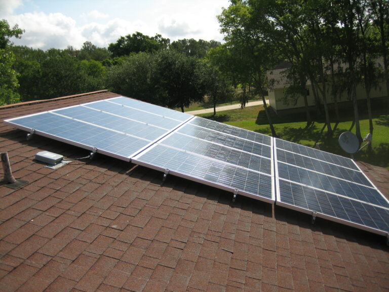 House roof with newly installed solar panels